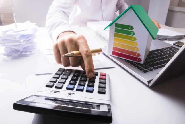 energy-efficiency-audit calculating energy bills and expenses for a home energy audit
