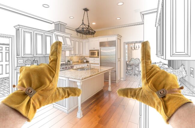 Male Contractor Hands Framing Completed Section of Custom Kitchen Design Drawing. Kitchen Remodeling Companies Fort Collins CO